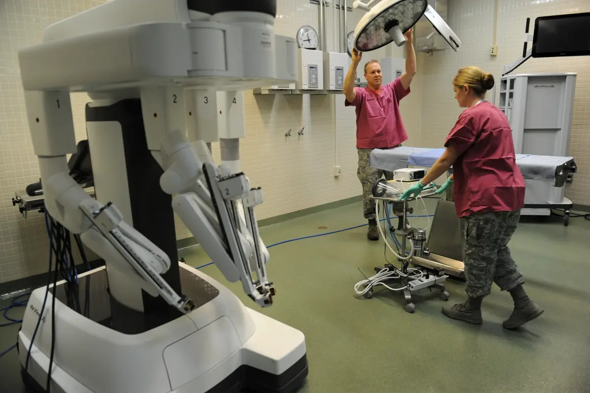 Clinicians training with a robotic surgery system