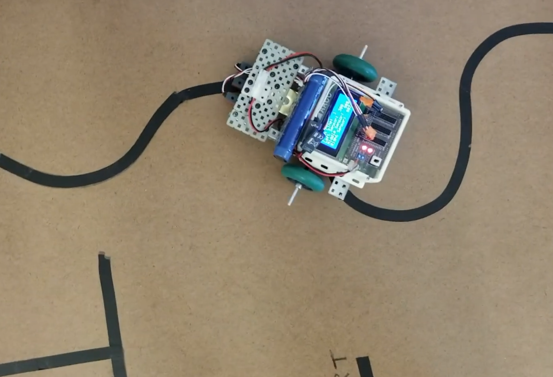 Small robot following a black line on a test track